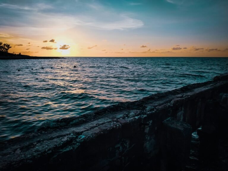 Travel Destinations - Eco Escape, peaceful beach side, mindful destinations, sunset view